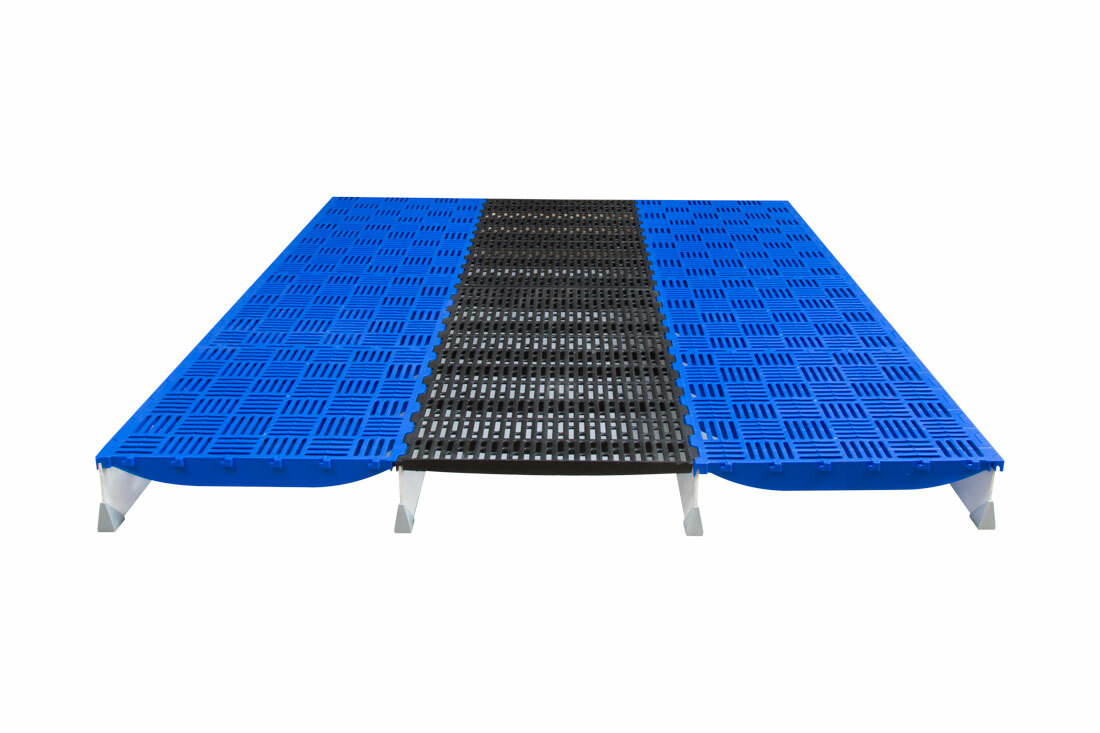 The Hog Slat plastic and cast iron combination farrowing floor provides a durable, cool surface for the sow and a warmer, plastic creep area floor for young pigs.