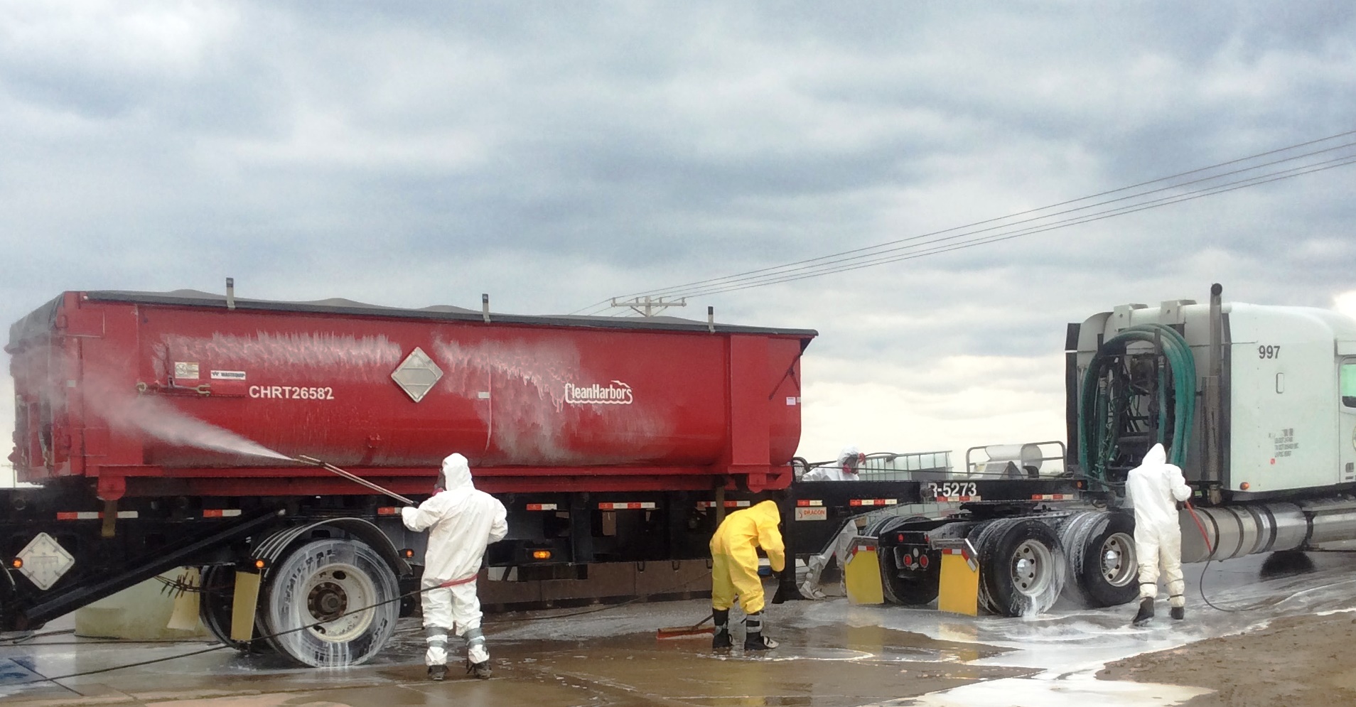 A feed truck being disinfected before entering a pig farm