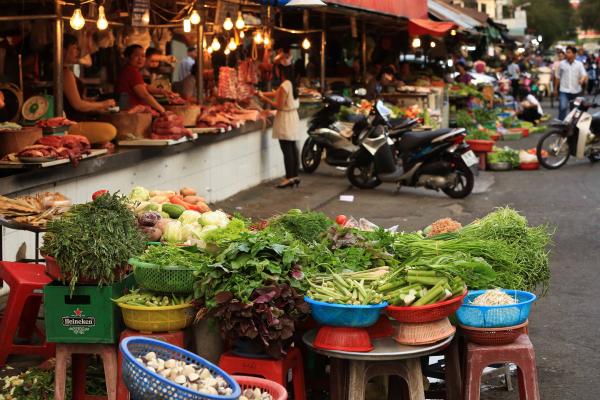 Market stall at wet market selling produce in Ho Chi Minh, Vietnam