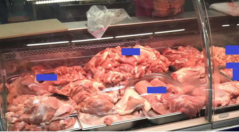 A marketing disaster, un-recognizable piles of meat on a counter.