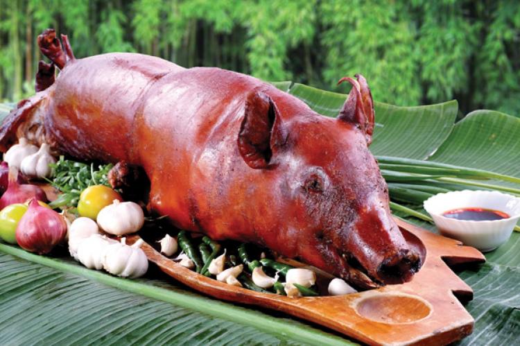 Lechon or whole roasted pig is still the most popular dish and an important status symbol for large family gatherings and festivals