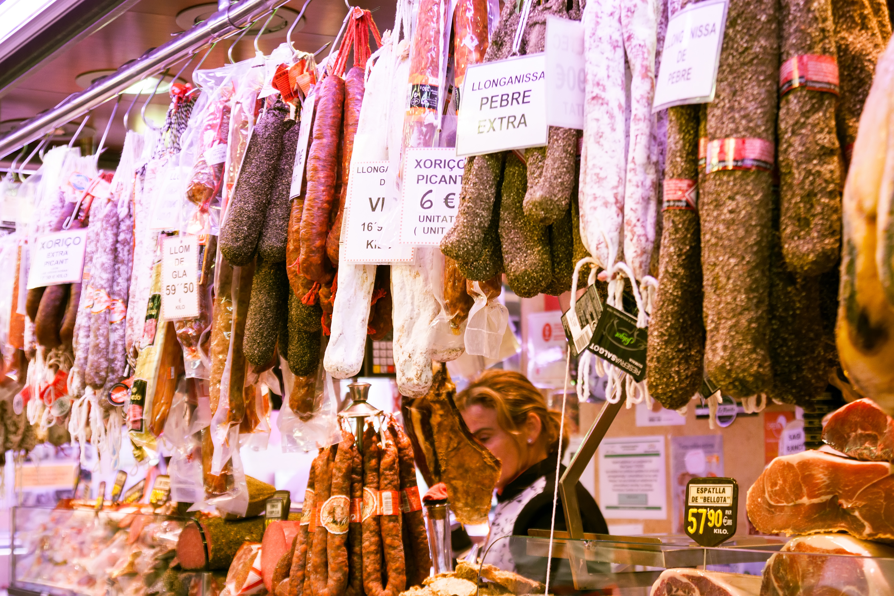 Outdoor market stall with cured meat