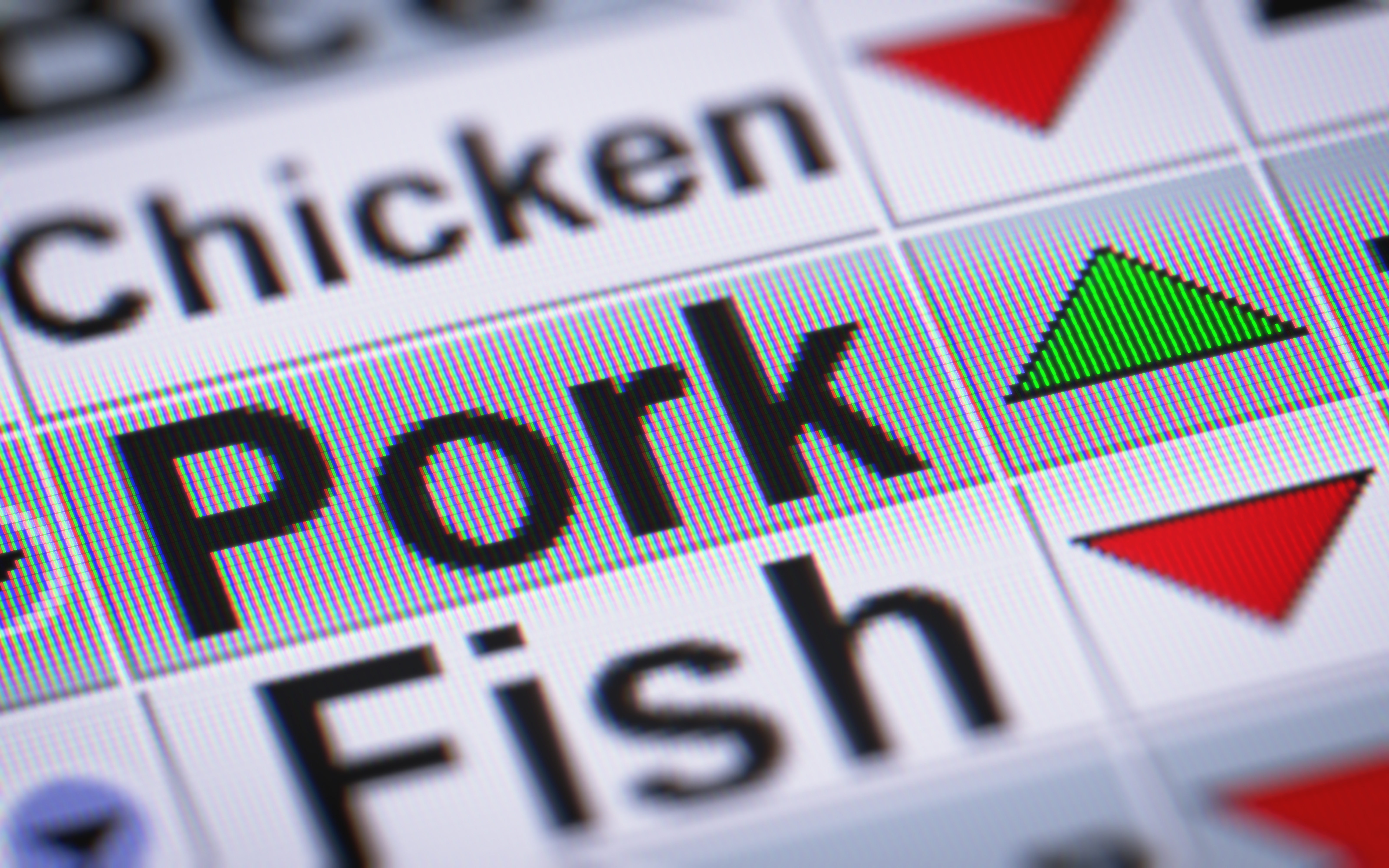 TV screen with a green arrow pointing up next to the word "pork"