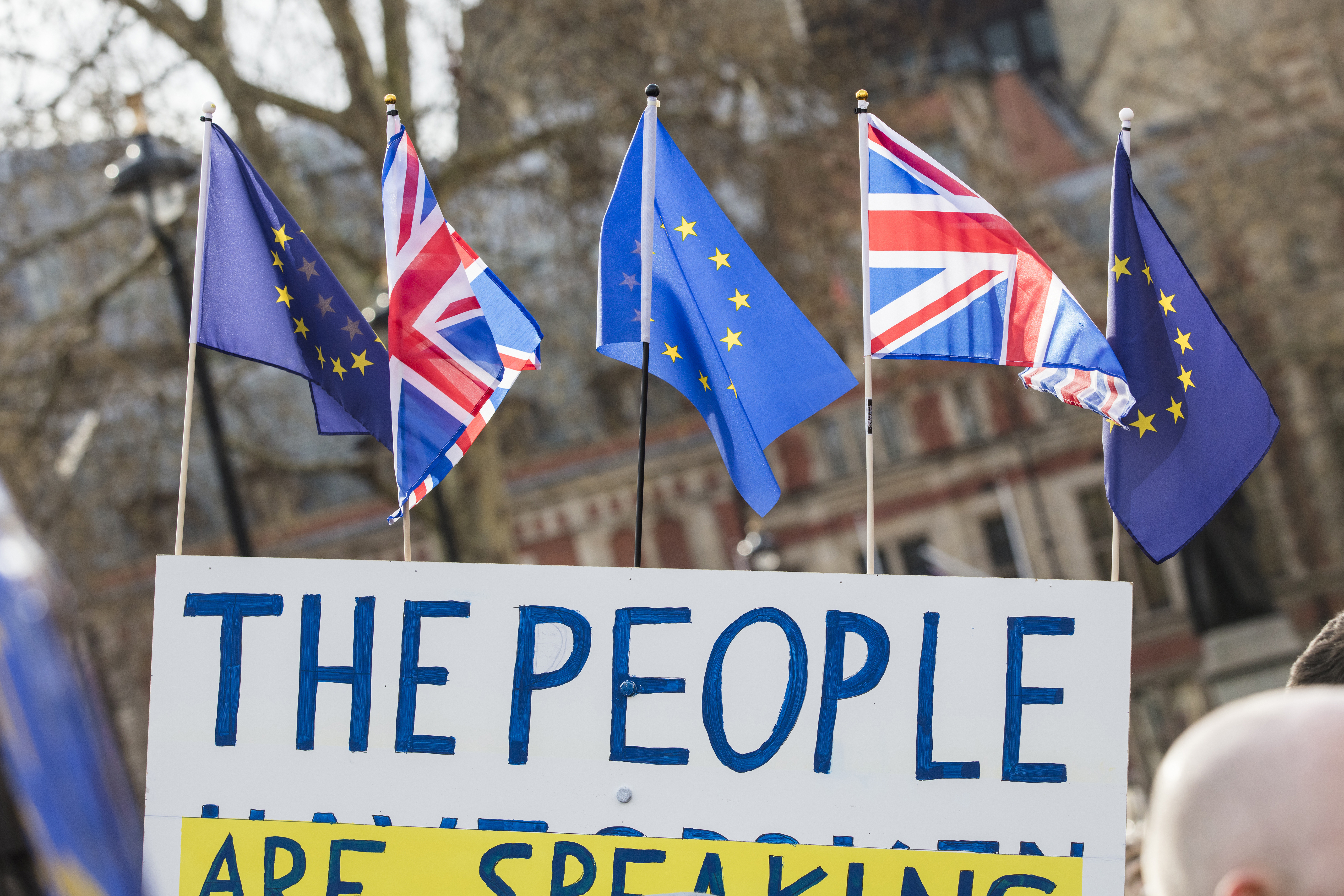 Anti-Brexit march outside Westminster with UK and EU flags