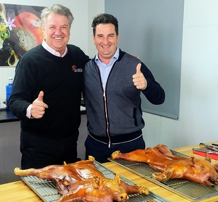 Jim Long with owner Javier Borao of Bopepor Group – over 400,000 suckling pigs sold per year to over 50 countries