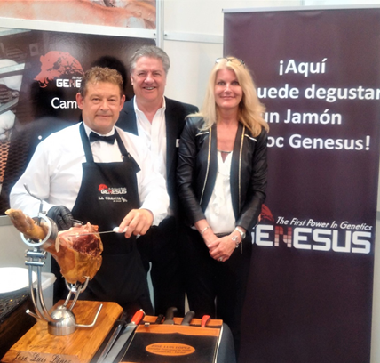 Jim Long and Sarah Long with Juan Luis, a professional butcher, slicing Genesus Duroc Serrano Ham for Figan visitors' enjoyment