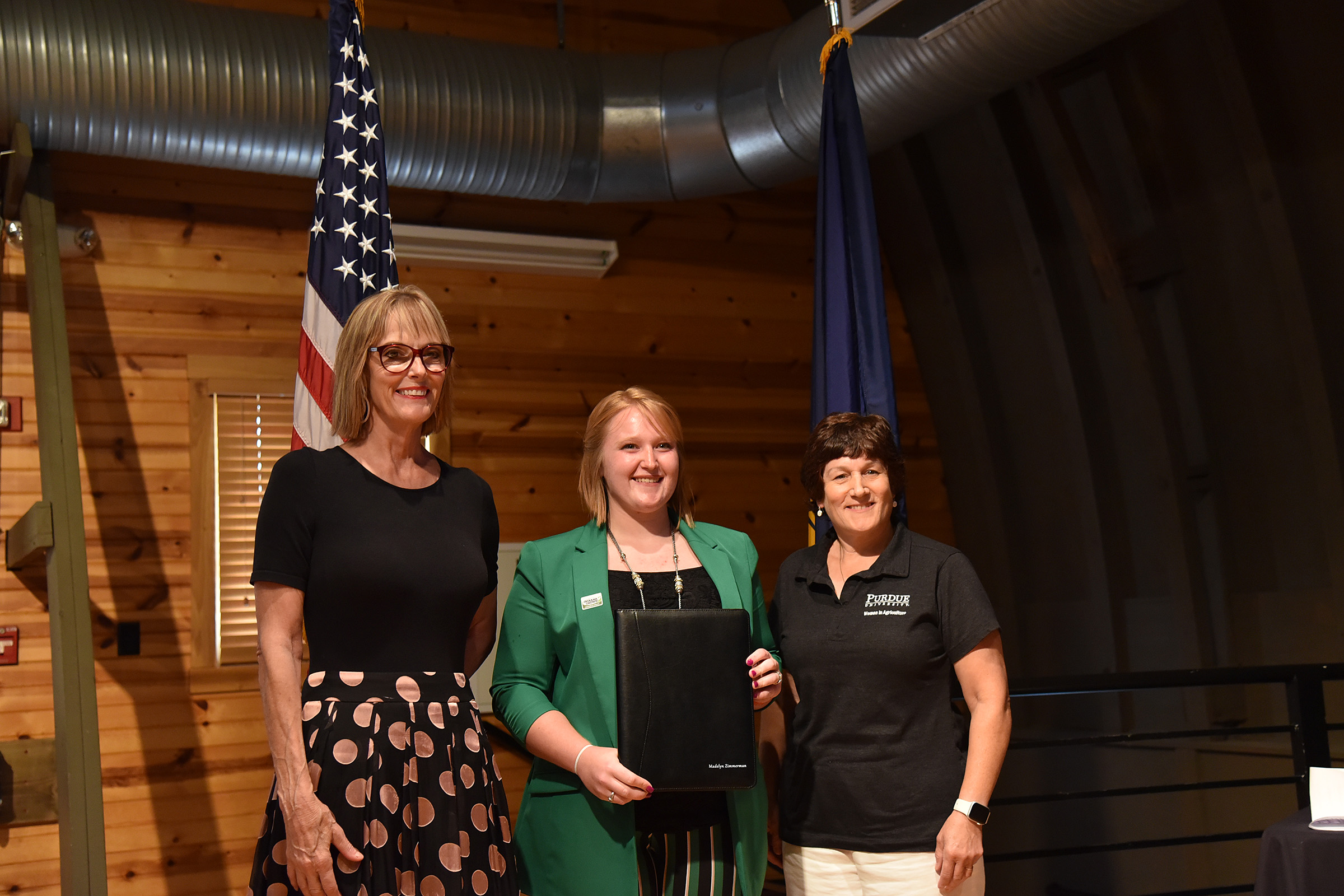 Suzanne Crouch, Madelyn Zimmerman and Karen Plut with the Women in Agriculture Award