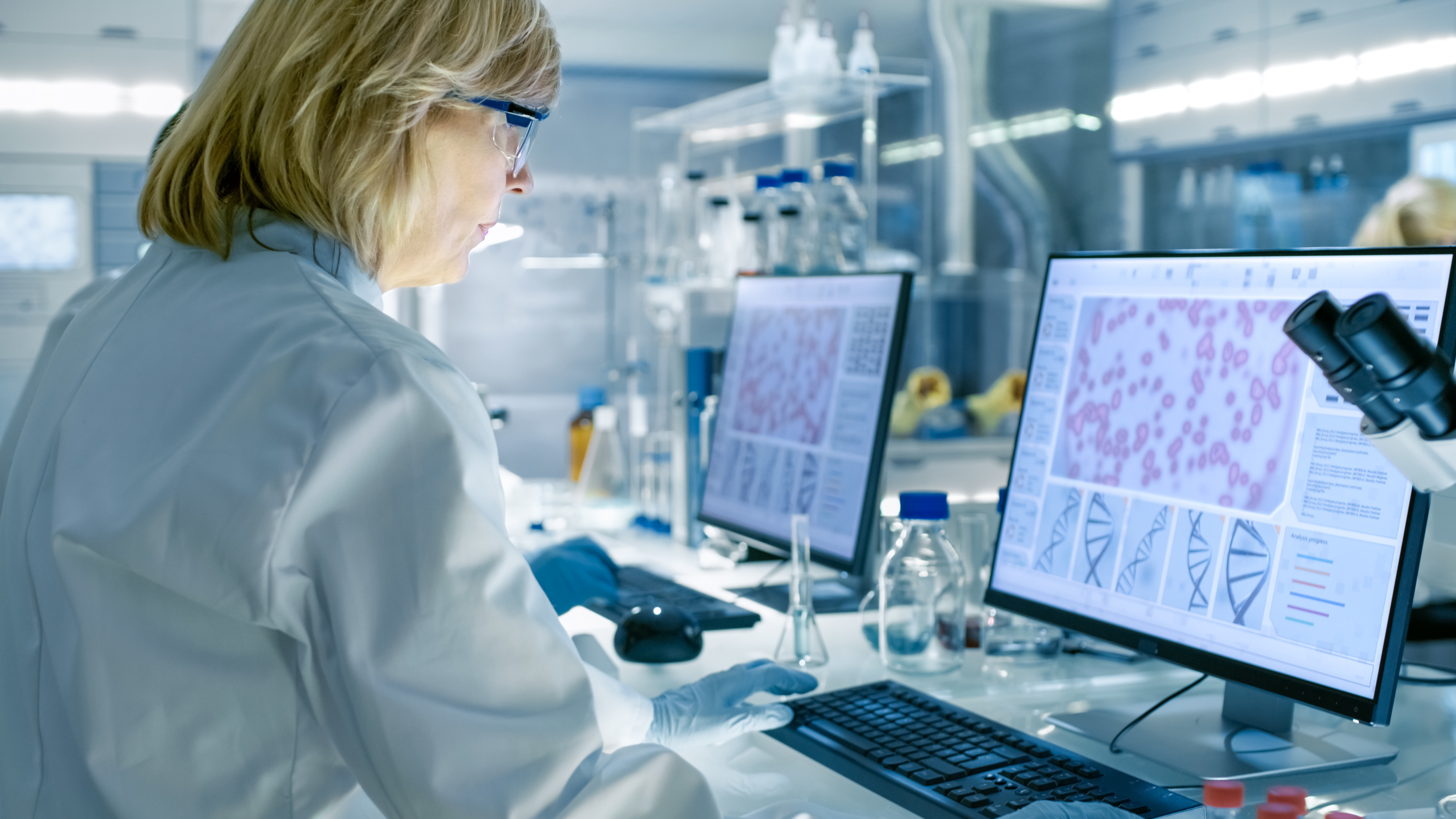 researcher studying virus dna in a laboratory