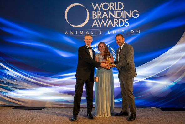 Damien Martin, Global Head of Pet Healthcare Business; Laura Correro, Head of Marketing Pets Health Care EMEA; and Thomas Went, Head of Global Marketing Activation Pet Healthcare accepting the Award.