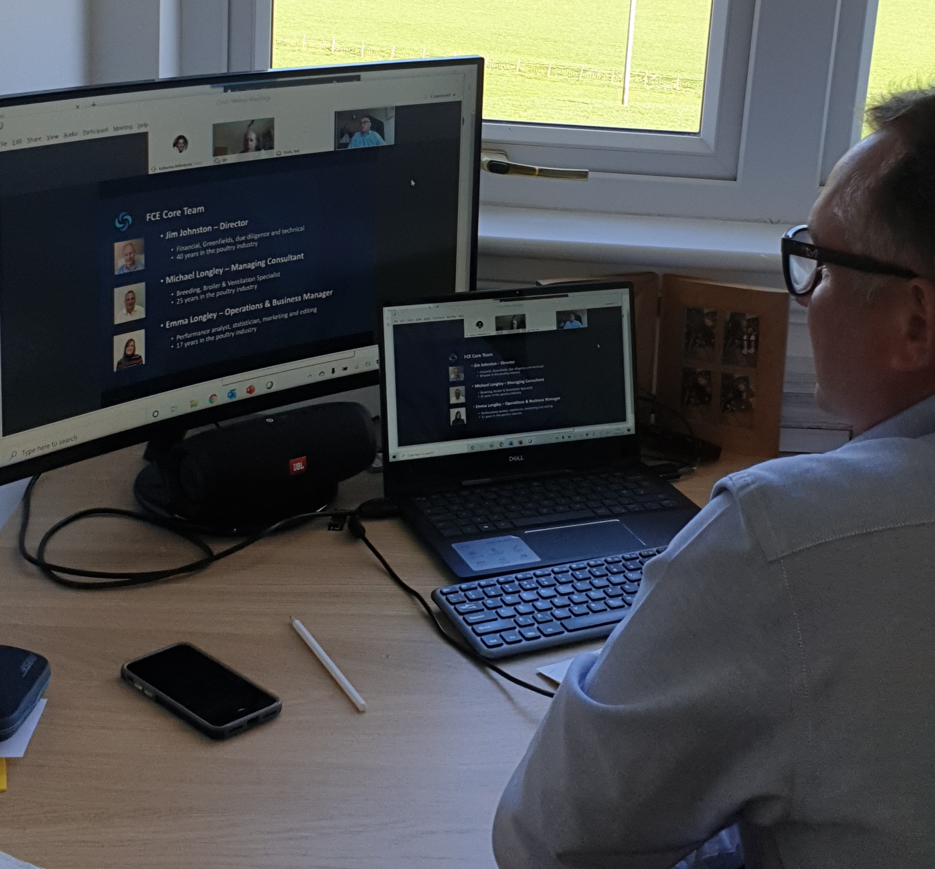 a man sits at a computer