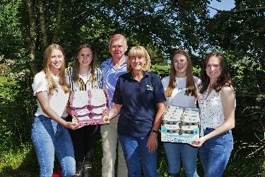 David and Helen Brass and family with their Laid With Love and Lakes egg brands