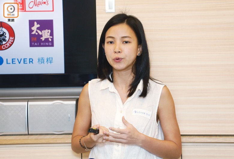 Katherine Ma speaking at a conference