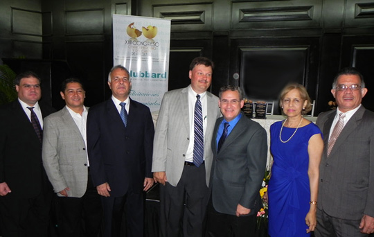 Juan Diaz (second from left) and Mark Barnes (center) from Hubbard, with members of the Panamanian Poultry Association at the awards ceremony