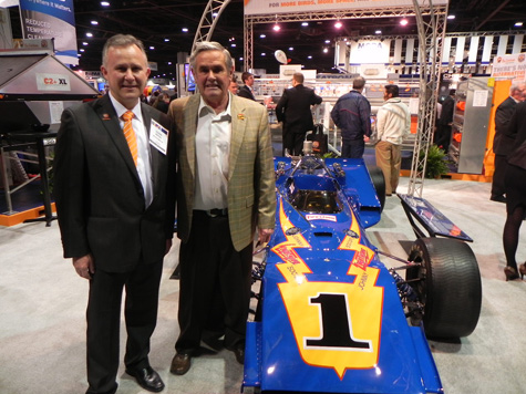 Clovis Rayzel, President of Big Dutchman, Inc (l) with Al Unser (r), four-time winner of the Indianapolis 500